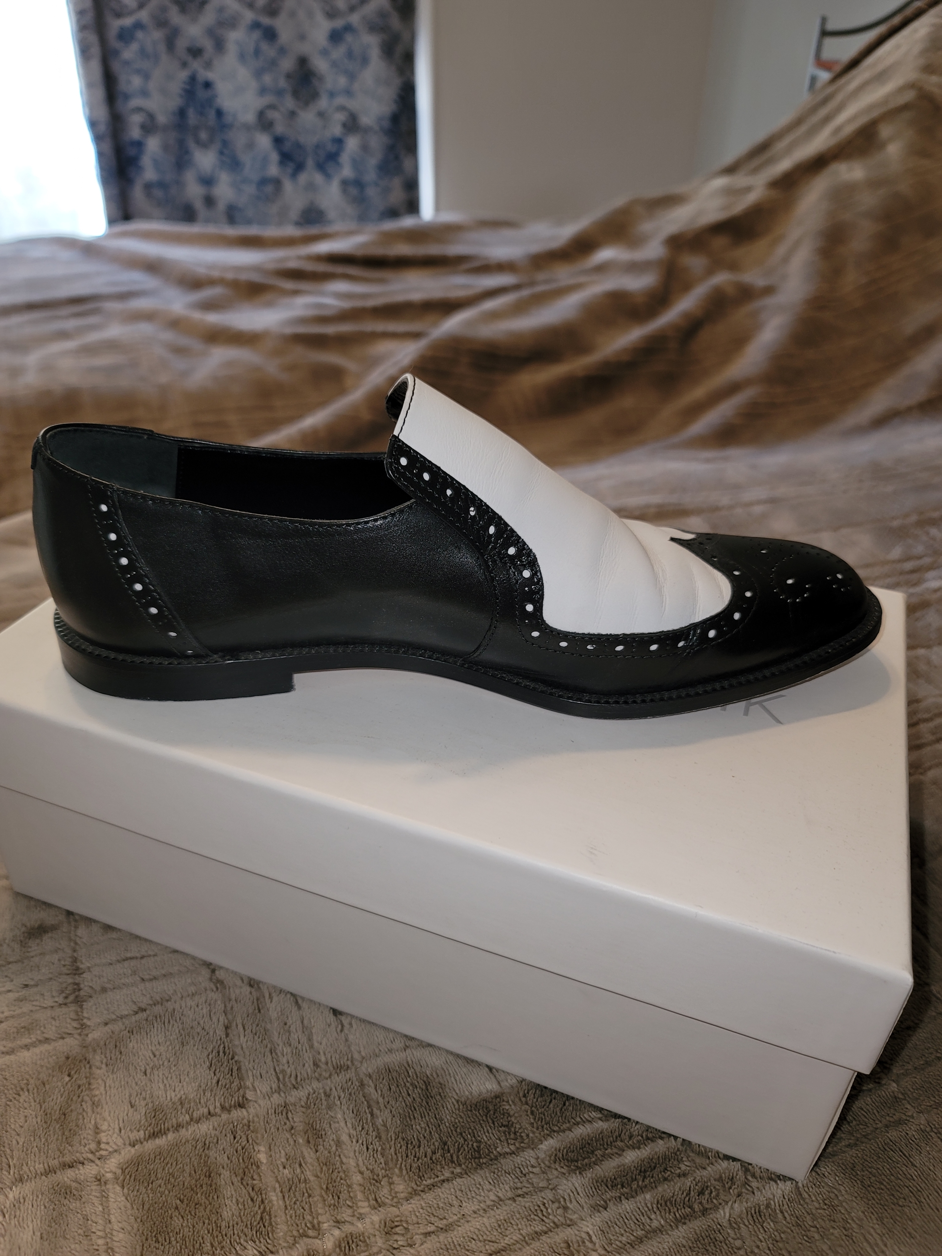 Manolo Blahnik Black And White Two-Tone Slip-On Brogue Loafer